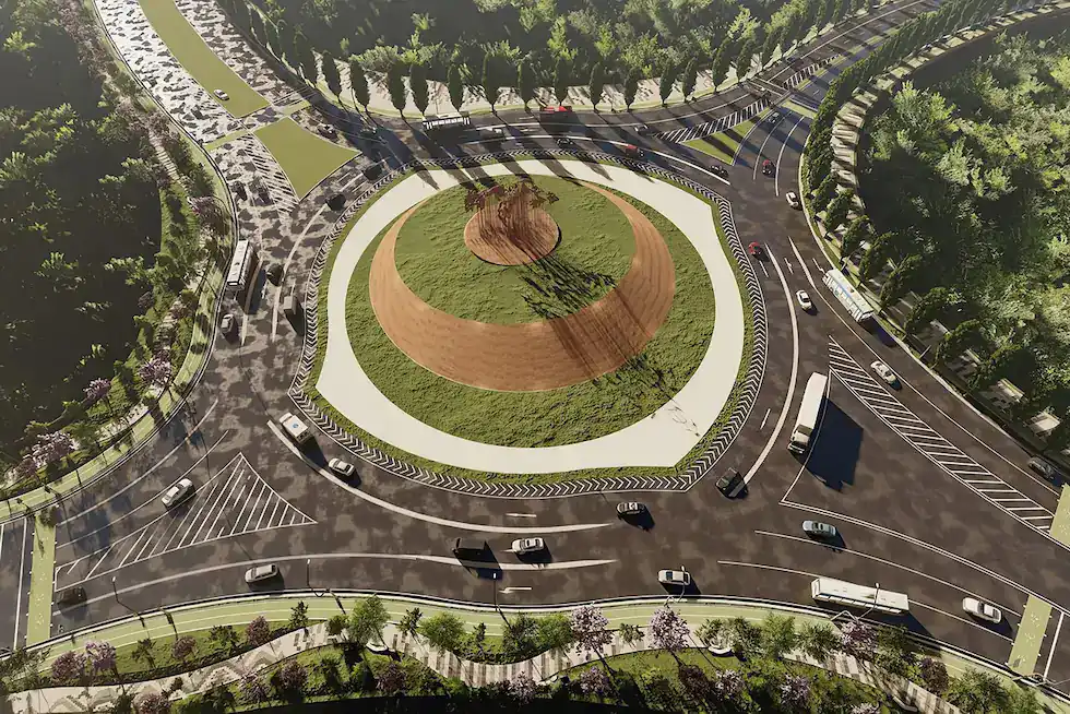 Aerial view of a large roundabout with multiple lanes, surrounding roads, and vehicles; the scene exemplifies industry leadership in urban planning. Grassy central island with a small tree in the middle. | Bentley Systems | Infrastructure Engineering Software Company Aerial view of a large roundabout with multiple lanes, surrounding roads, and vehicles; the scene exemplifies industry leadership in urban planning. Grassy central island with a small tree in the middle.